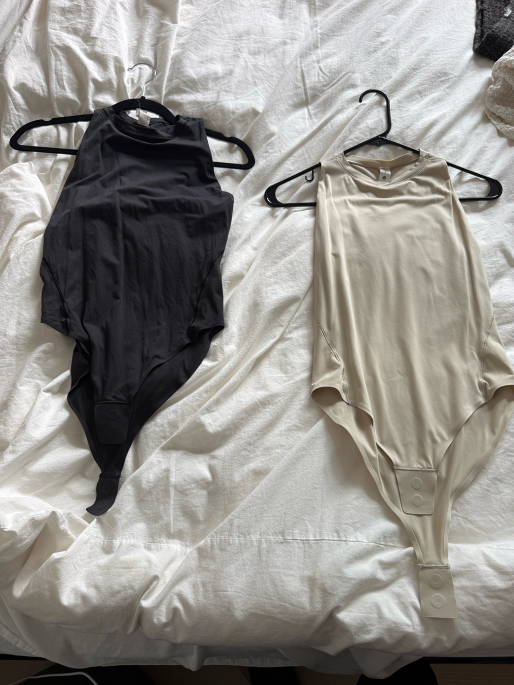 2 lululemon athletica Black High-Neck One-Piece Bodysuits
